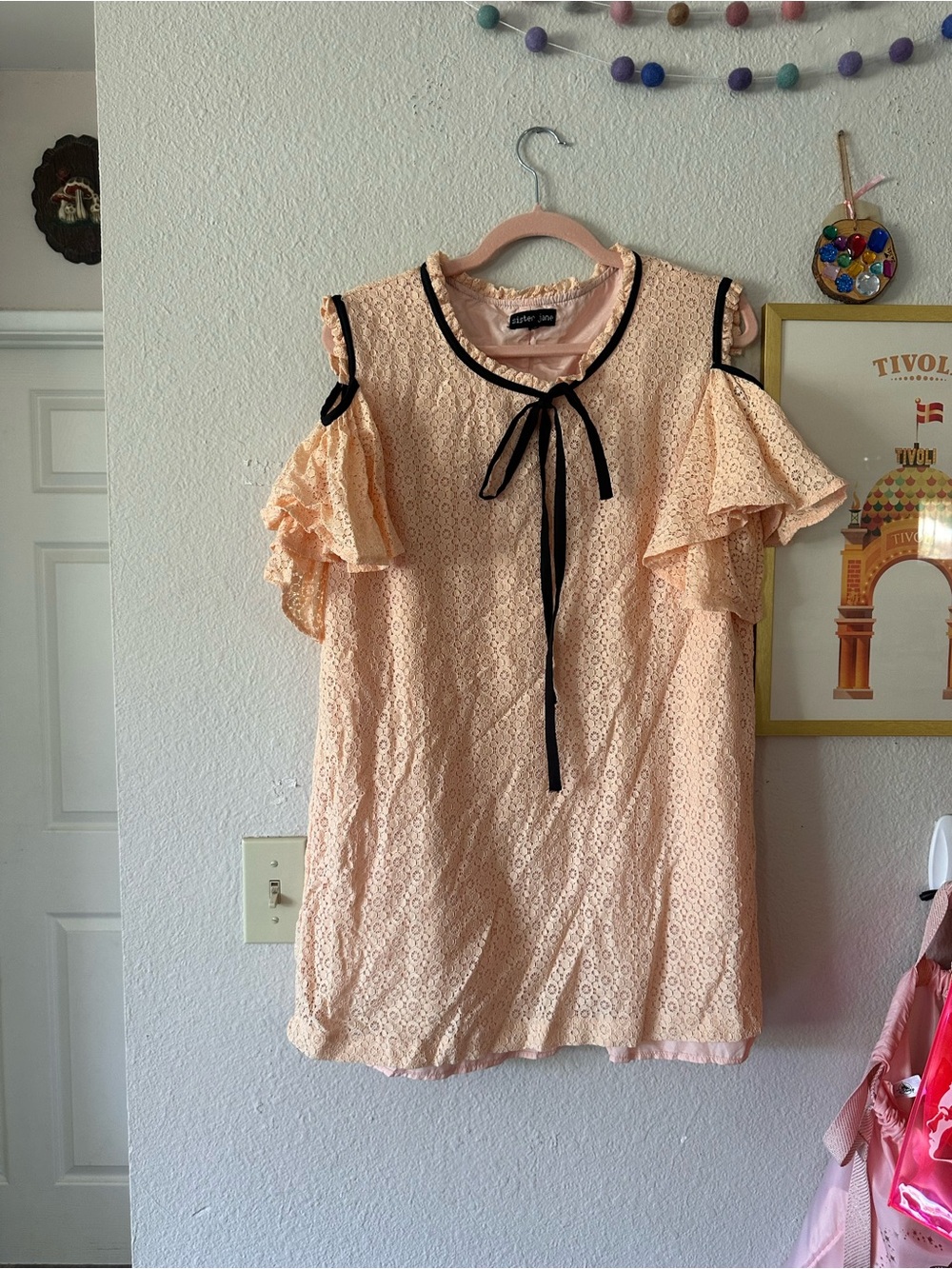 Sister Jane Peach Lace Cold-Shoulder Blouse with Black Trim
